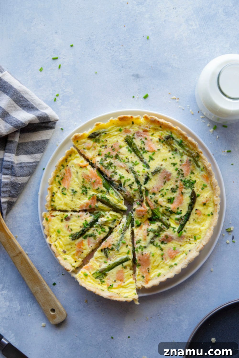 Delightful Asparagus Smoked Salmon Quiche for a gourmet brunch, featuring a buttery crust and silky egg filling.