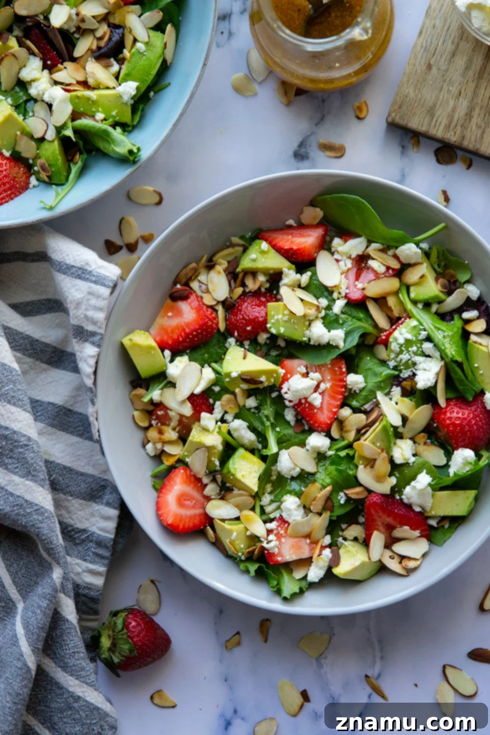 Vibrant Strawberry Avocado Salad with Tangy Maple Dijon 5 This strawberry avocado salad is loaded with juicy strawberries, silky avocado, and tossed in a sweet dijon maple dressing. - a quick and beautiful salad to throw together last minute!