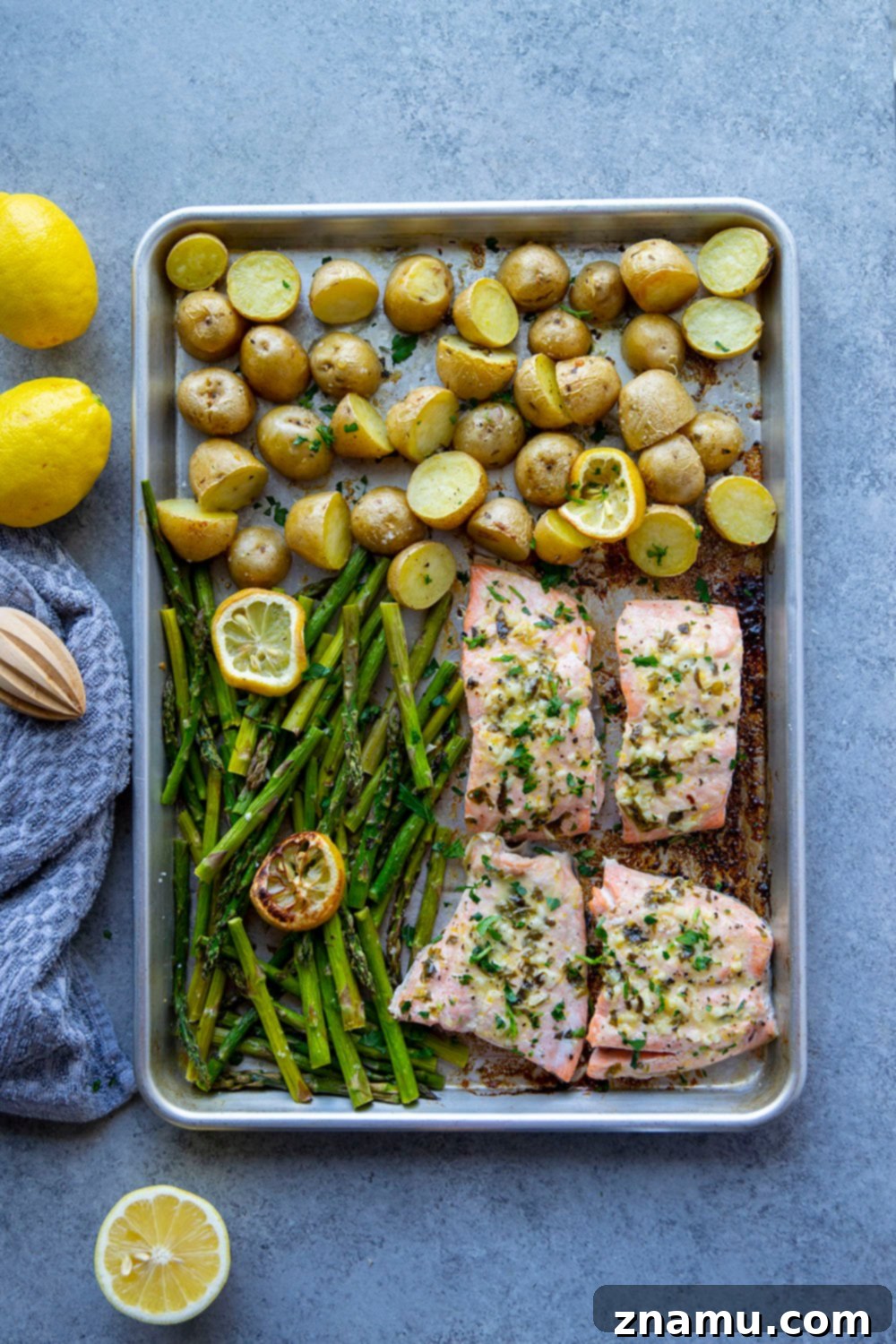Bright Lemon Garlic Salmon with Spring Asparagus and Potatoes 2 Roasted entirely on one sheet pan with tender asparagus and baby potatoes, this lemon garlic butter salmon is quick to put on the table and only needs a handful of basic ingredients!