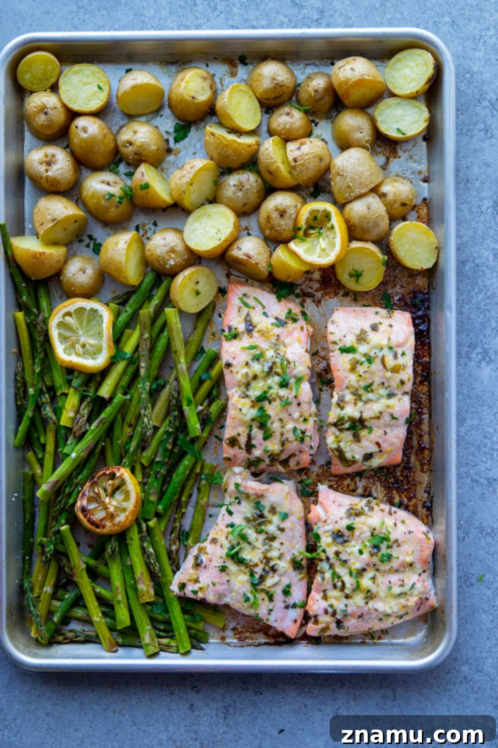 Bright Lemon Garlic Salmon with Spring Asparagus and Potatoes 3 Roasted entirely on one sheet pan with tender asparagus and baby potatoes, this lemon garlic butter salmon is quick to put on the table and only needs a handful of basic ingredients!