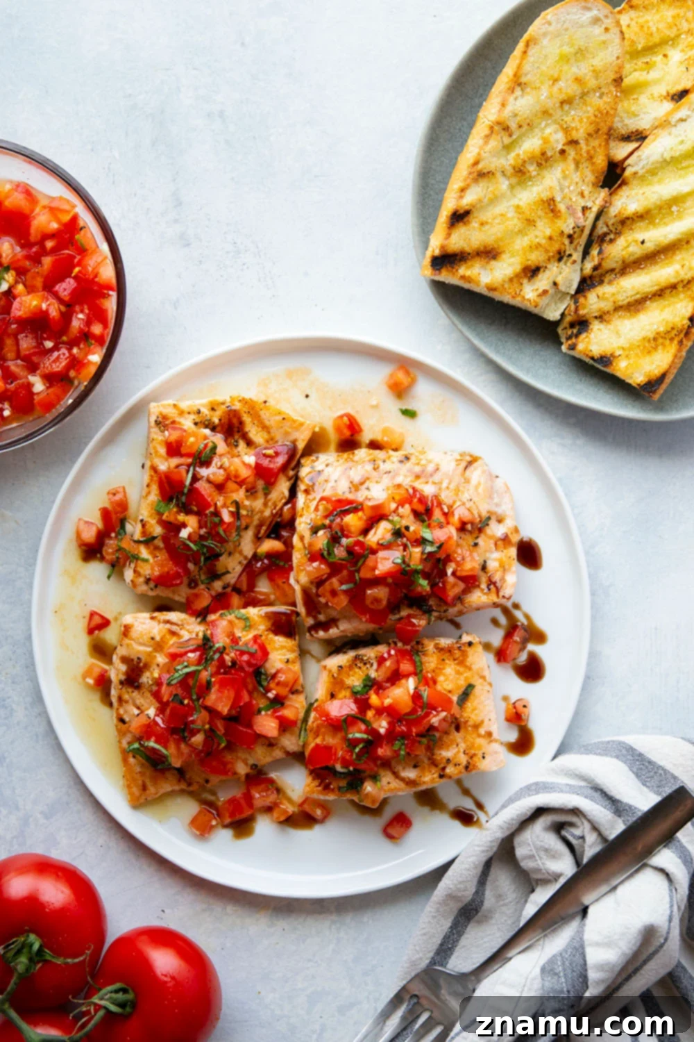 Grilled Salmon Meal Platter This grilled bruschetta salmon features perfectly grilled salmon fillets with a flavorful tomato bruschetta topping piled over top and lots of crusty grilled bread on the side.