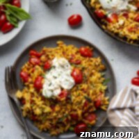 Harissa Cherry Tomato Orzo with a Burst of Burrata 8 Harissa Cherry Tomato Orzo with Burrata, a delicious pasta dish