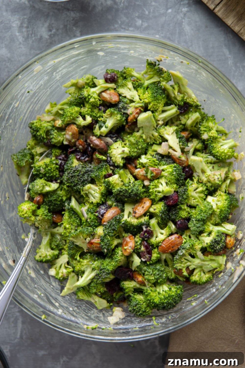 Bright Lemon Tahini Broccoli Salad with Toasted Almonds 2 This almond broccoli salad features crisp broccoli and crunchy roasted almonds tossed in a creamy lemon tahini dressing. - it will quickly become a side dish favorite!