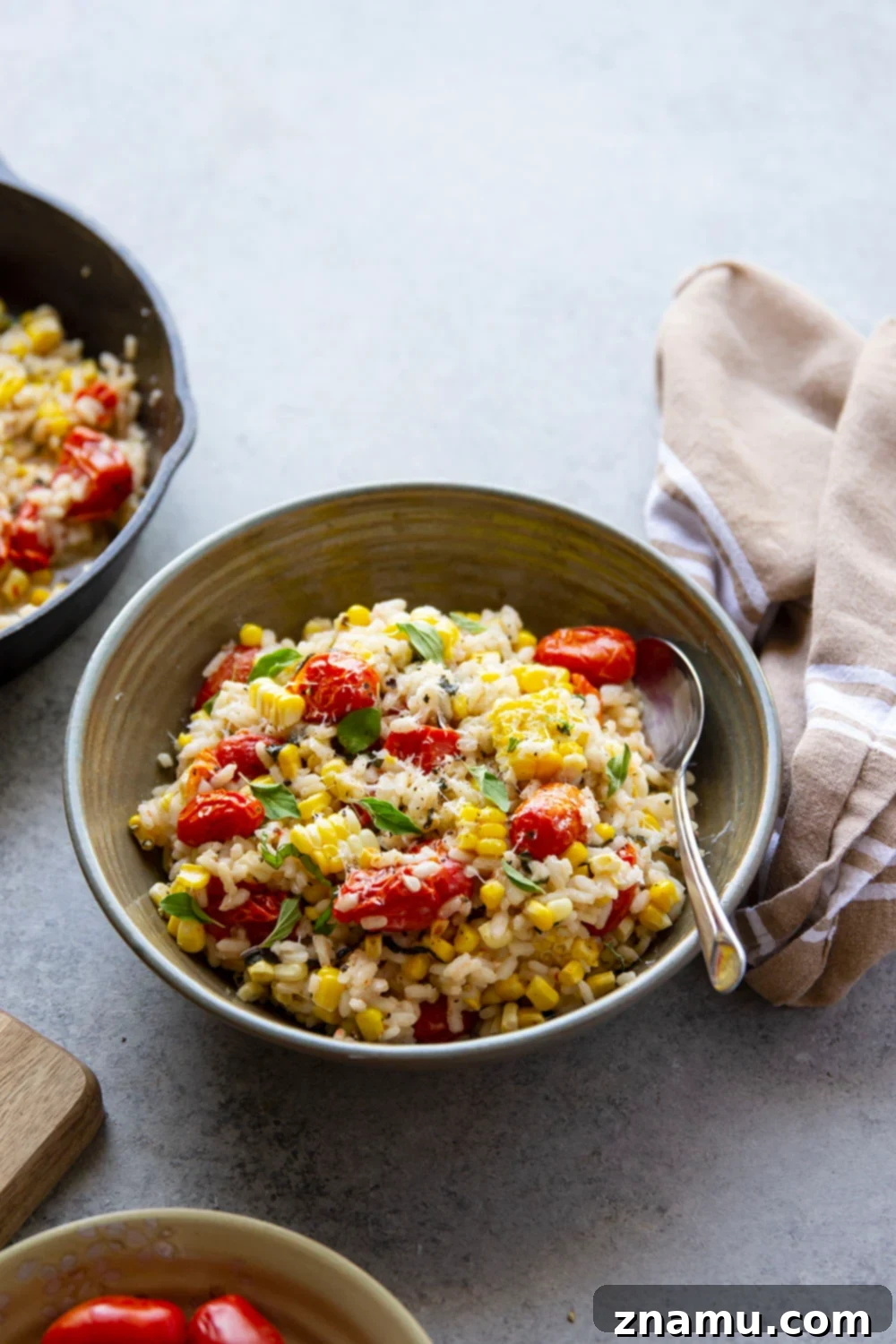 Golden Corn Risotto with Sun-Kissed Tomatoes 2 Sweet Corn Risotto with Bursting Cherry Tomatoes - a creamy, summery comfort food dish.
