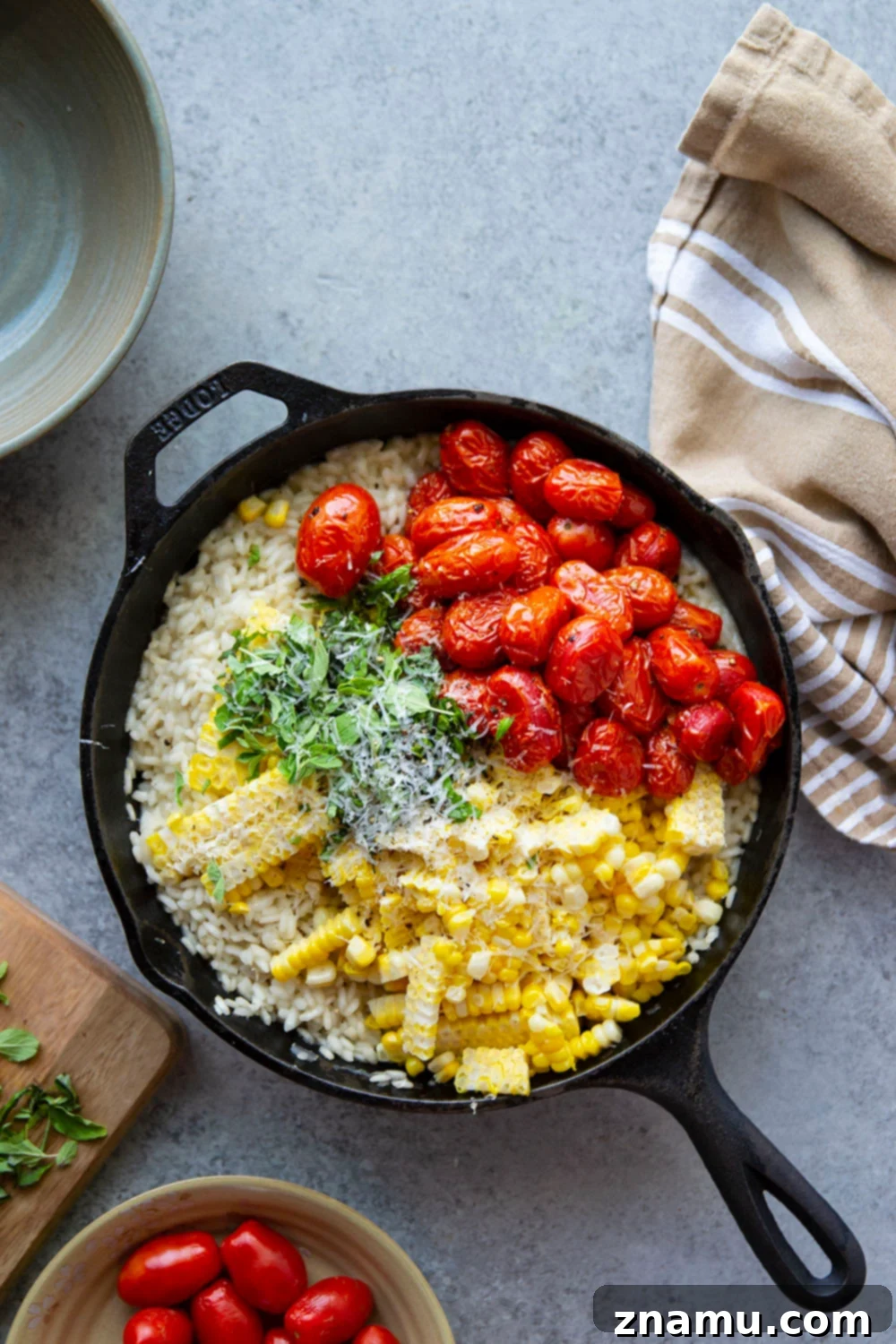 Golden Corn Risotto with Sun-Kissed Tomatoes 4 Ingredients for sweet corn and cherry tomato risotto laid out, highlighting freshness.