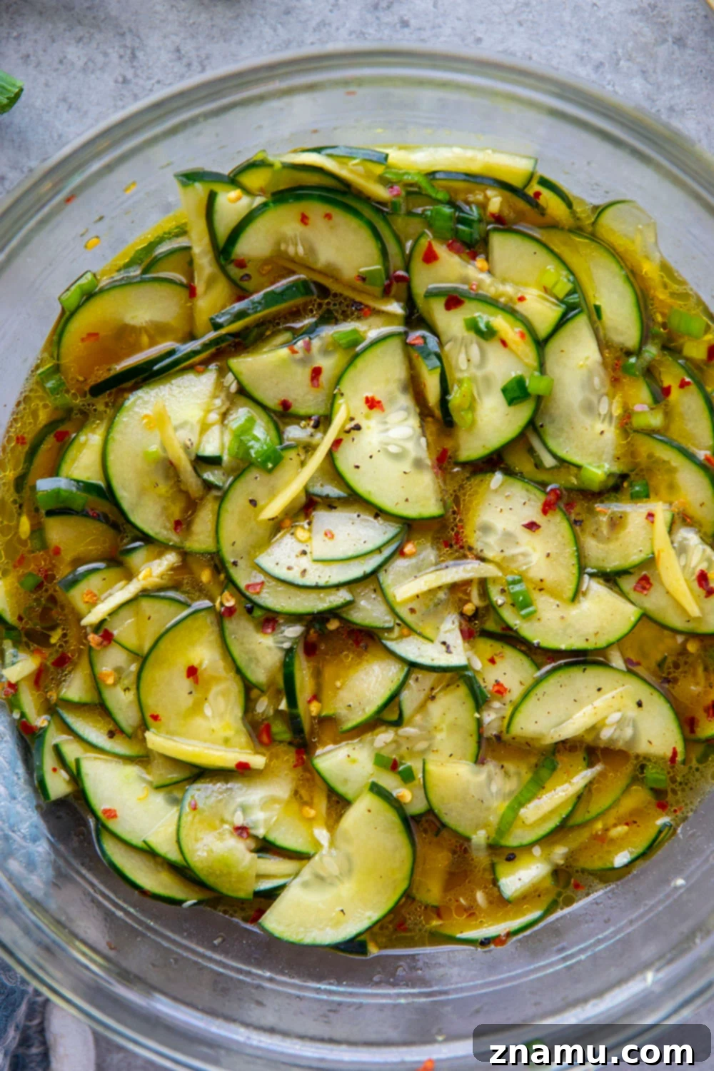 Refreshing Cucumber Ginger Salad 6 Marinated in a spicy ginger dressing and packed with crisp cucumbers, this cucumber ginger salad is a fast summer salad to pull off and perfect for an abundance of cucumbers!