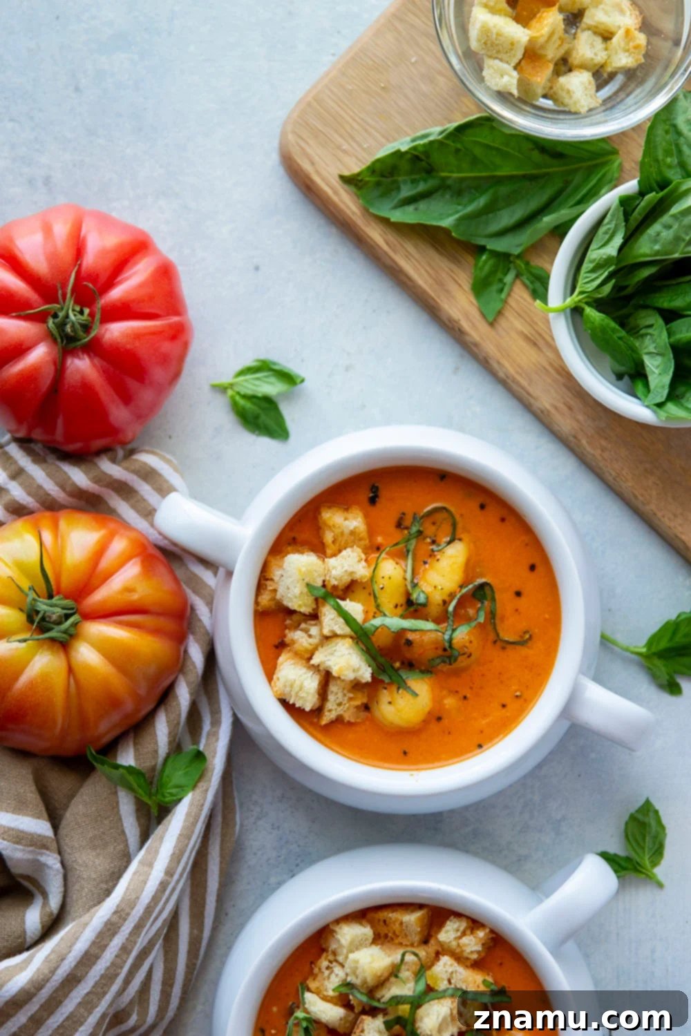 Velvet Tomato Gnocchi Soup 2 Indulge in this exquisite Roasted Tomato Gnocchi Soup, a symphony of soft gnocchi nestled in a rich, vibrant tomato base crafted from perfectly roasted fresh tomatoes. A delightful and comforting meal, ready in under an hour, guaranteed to become a cherished recipe.