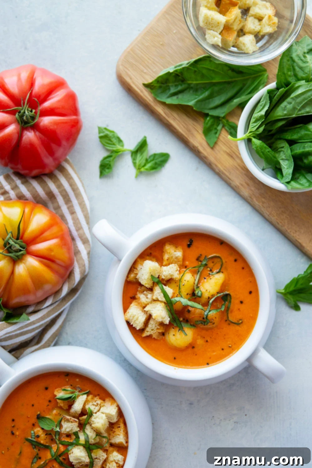 Velvet Tomato Gnocchi Soup 4 Experience the ultimate comfort with this Roasted Tomato Gnocchi Soup, featuring a vibrant, creamy base crafted from fresh roasted tomatoes and tender gnocchi. Quick to prepare in under an hour, it's destined to become a staple in your recipe collection.