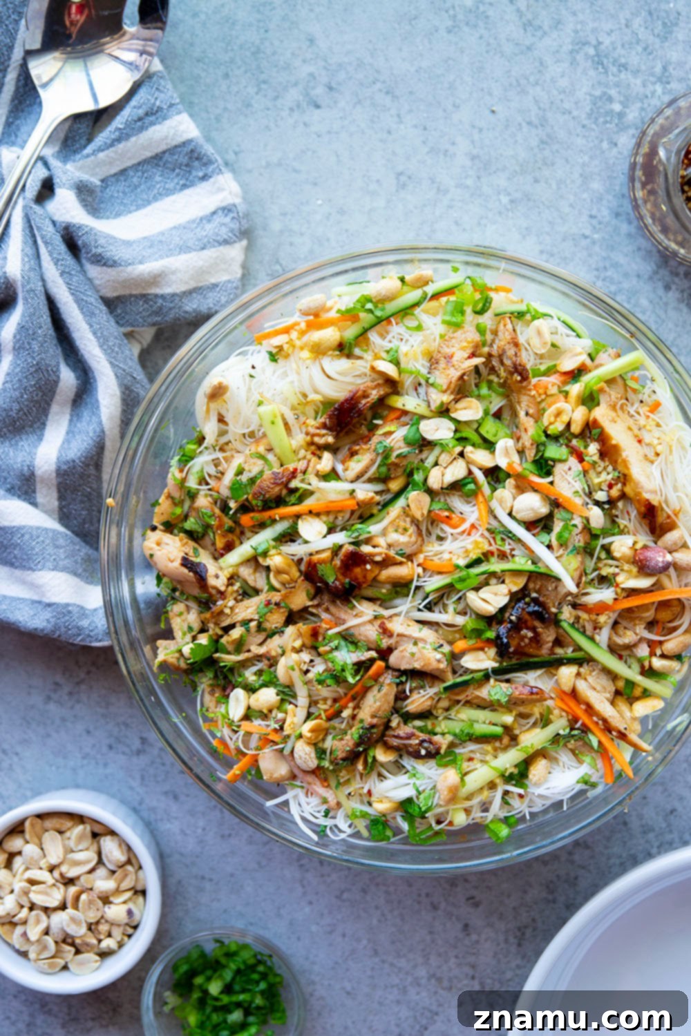 Chargrilled Chicken Vietnamese Noodle Bowl 4 Plating the fresh ingredients for a homemade Vietnamese Noodle Salad.