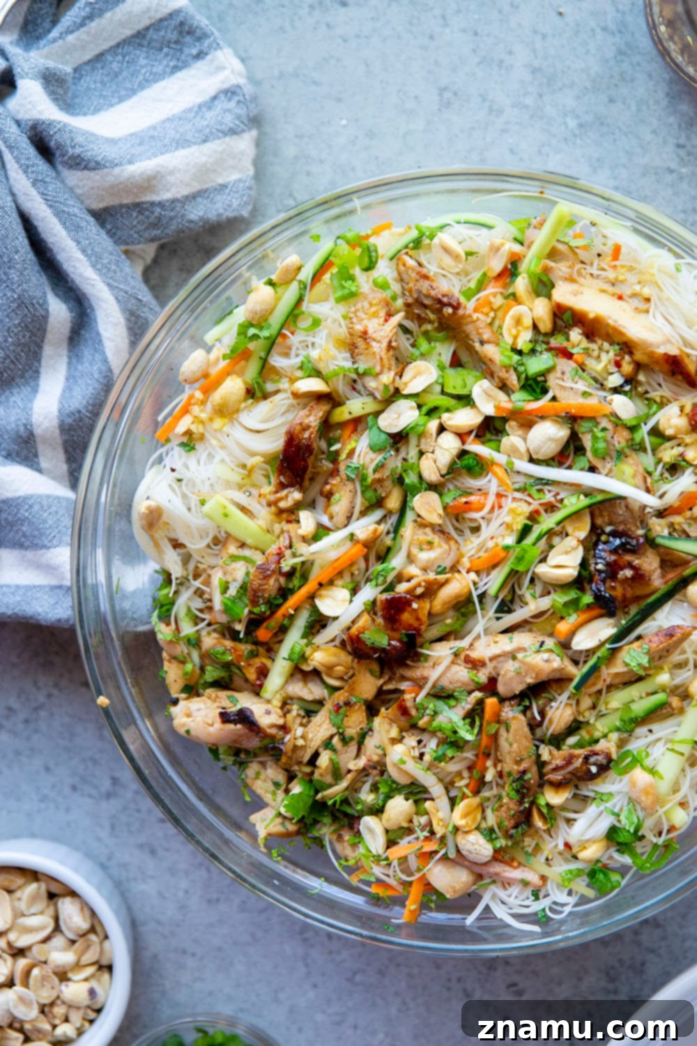Chargrilled Chicken Vietnamese Noodle Bowl 5 Ingredients being prepped for Vietnamese Noodle Salad on a cutting board.