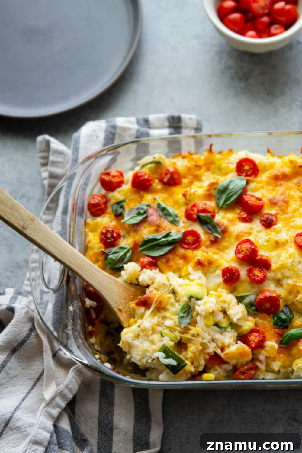 Golden Cheesy Zucchini Rice Bake 4 Loaded with cheese and lots of tender zucchini, this cheesy zucchini rice casserole is the perfect use for extra zucchini and the easiest comfort food to make with leftover rice!