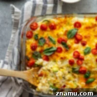 Loaded with cheese and lots of tender zucchini, this cheesy zucchini rice casserole is the perfect use for extra zucchini and the easiest comfort food to make with leftover rice!