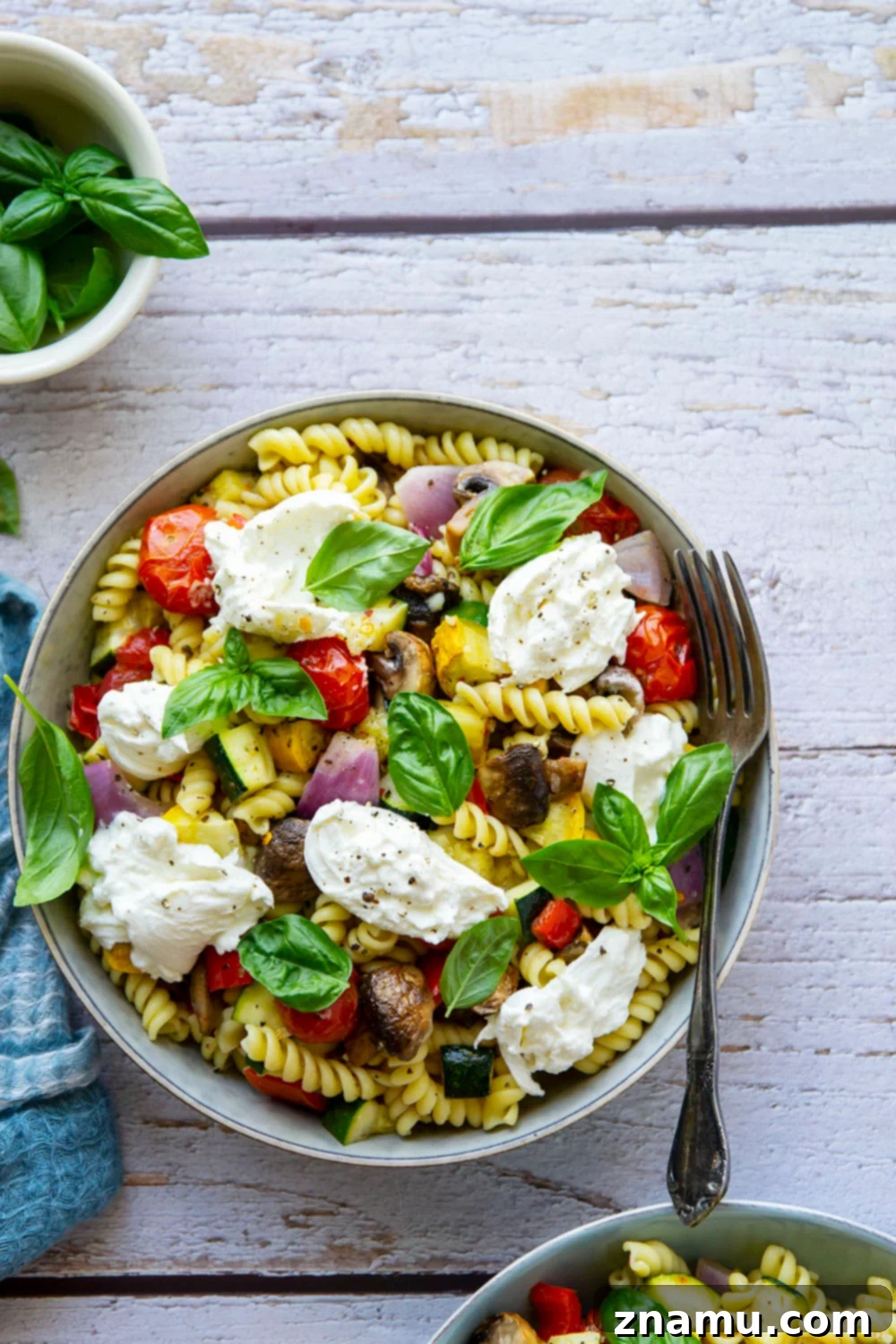 Sun-Drenched Roasted Vegetables & Burrata Pasta 2 This roasted vegetable pasta features a rainbow of tender roasted summer vegetables tossed with pasta and topped with lots of fresh basil and burrata cheese.