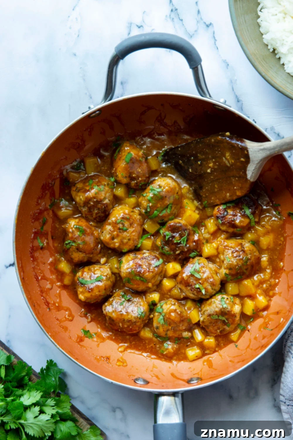Pineapple Glazed Jerk Chicken Bites 2 Spicy jerk chicken meatballs simmered in a sweet and perfectly sticky pineapple sauce are packed full of flavor and heavenly served over fluffy rice!
