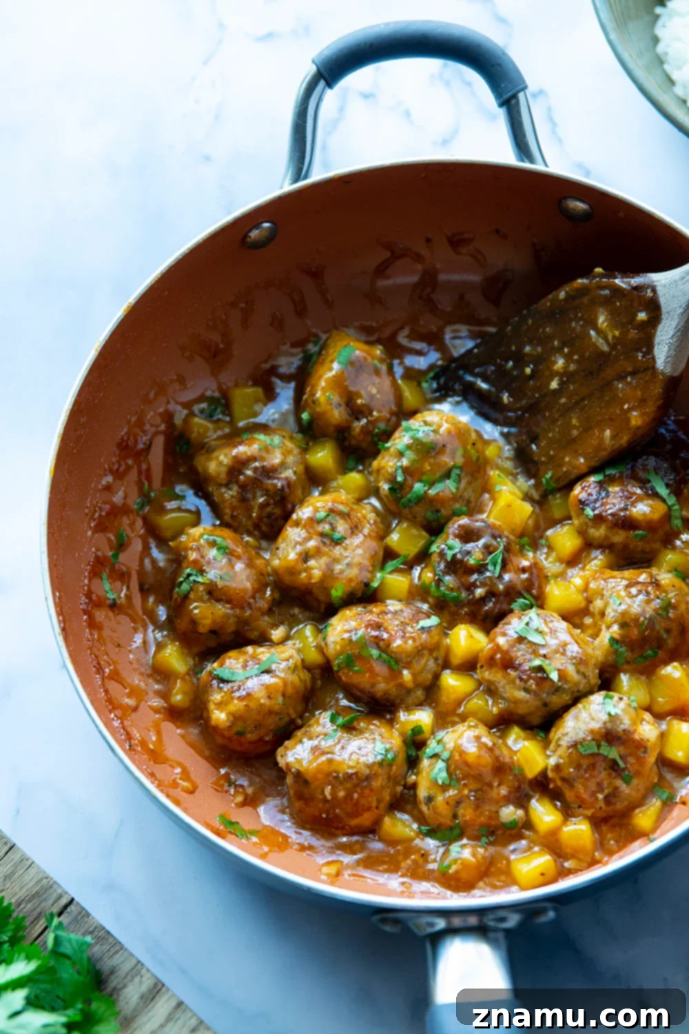 Pineapple Glazed Jerk Chicken Bites 3 Spicy jerk chicken meatballs simmered in a sweet and perfectly sticky pineapple sauce are packed full of flavor and heavenly served over fluffy rice!