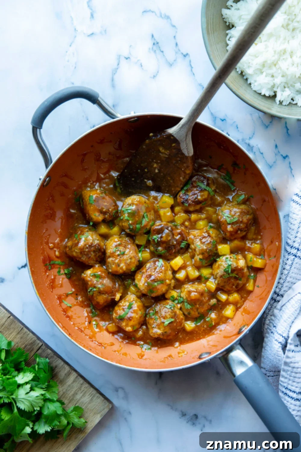 Pineapple Glazed Jerk Chicken Bites 5 Spicy jerk chicken meatballs simmered in a sweet and perfectly sticky pineapple sauce are packed full of flavor and heavenly served over fluffy rice!
