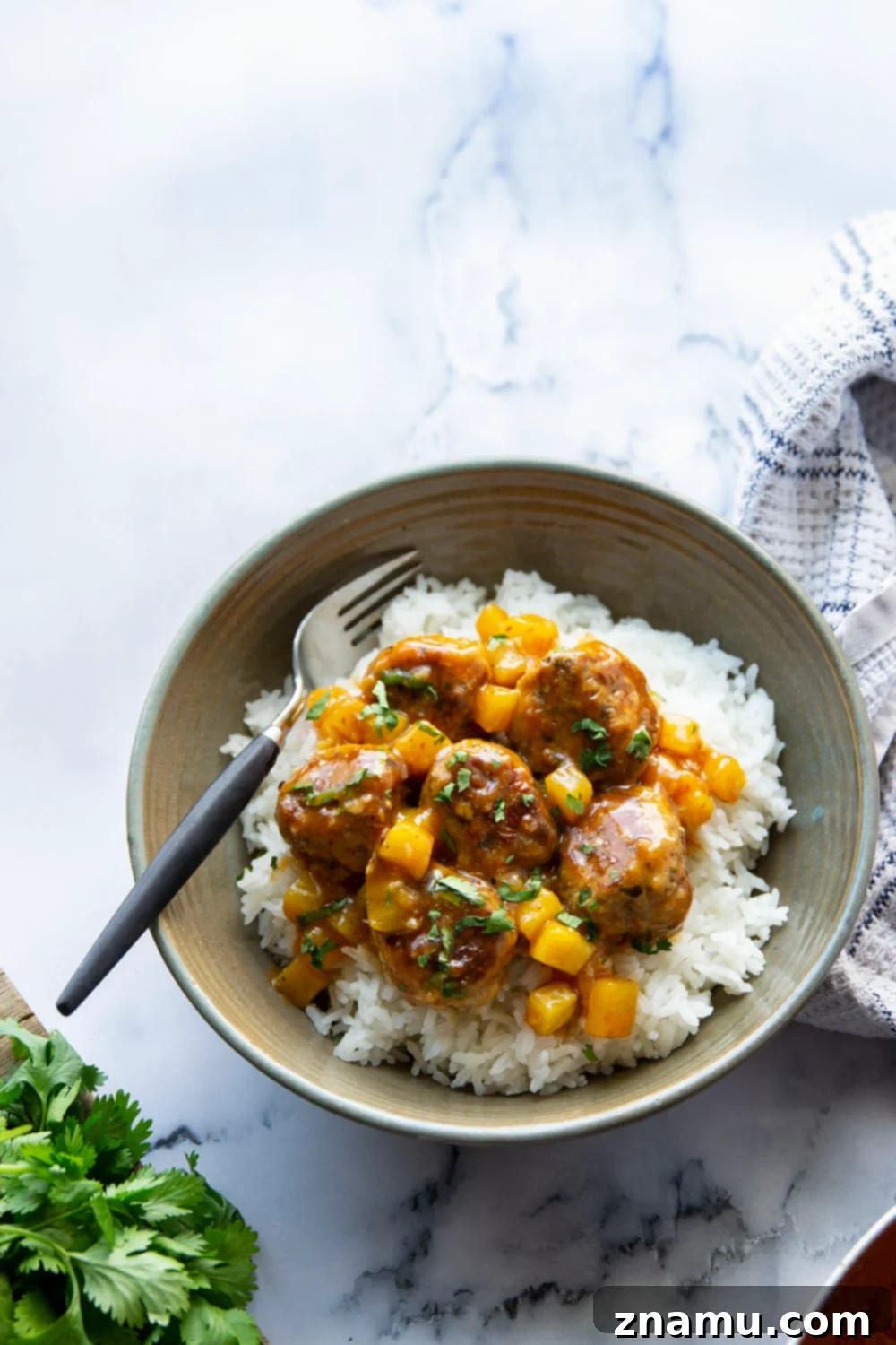 Pineapple Glazed Jerk Chicken Bites 6 Spicy jerk chicken meatballs simmered in a sweet and perfectly sticky pineapple sauce are packed full of flavor and heavenly served over fluffy rice!