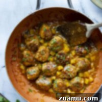 Spicy jerk chicken meatballs simmered in a sweet and perfectly sticky pineapple sauce are packed full of flavor and heavenly served over fluffy rice!
