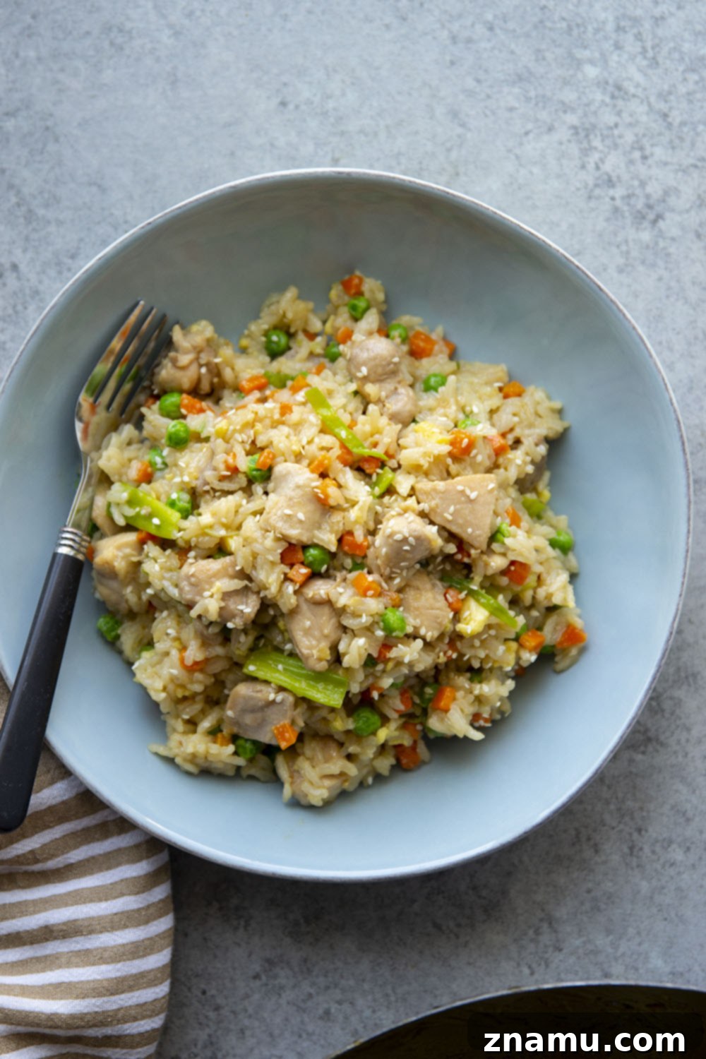 Glazed Teriyaki Chicken Fried Rice 2 This teriyaki chicken fried rice features saucy homemade teriyaki chicken folded into a flavorful veggie-loaded fried rice. Ready in under an hour and the perfect use for leftover rice!