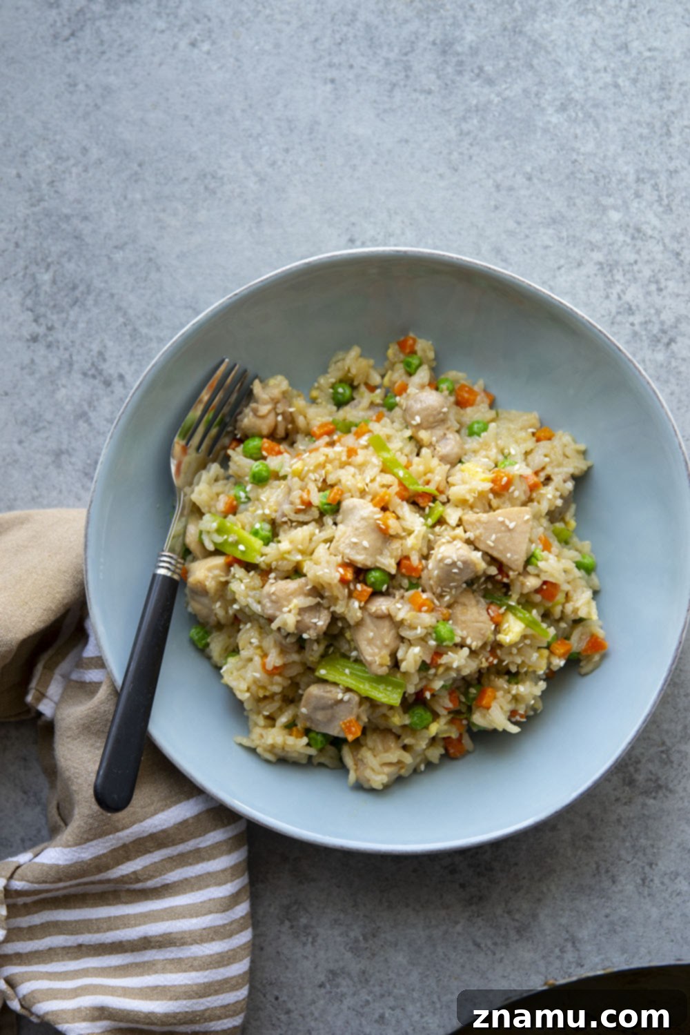 Glazed Teriyaki Chicken Fried Rice 4 This teriyaki chicken fried rice features saucy homemade teriyaki chicken folded into a flavorful veggie-loaded fried rice. Ready in under an hour and the perfect use for leftover rice!