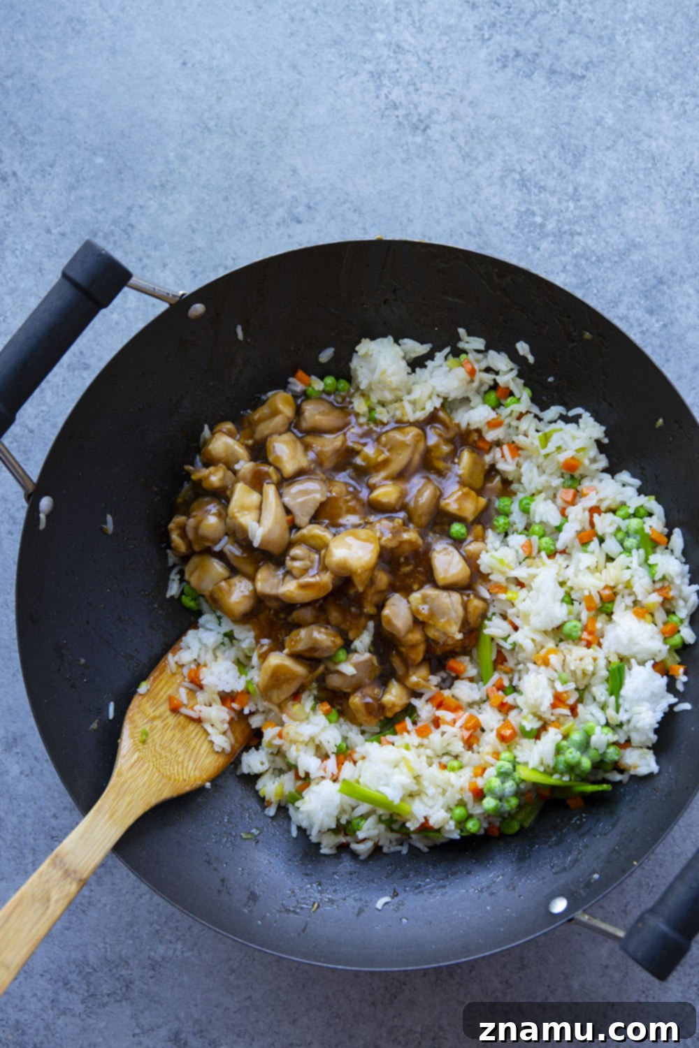 Glazed Teriyaki Chicken Fried Rice 5 This teriyaki chicken fried rice features saucy homemade teriyaki chicken folded into a flavorful veggie-loaded fried rice. Ready in under an hour and the perfect use for leftover rice!