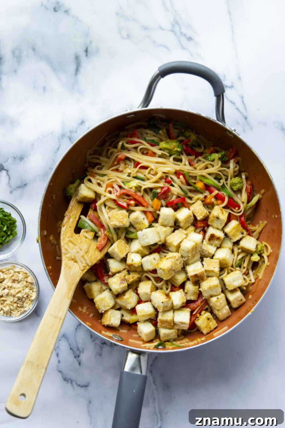 Creamy Peanut Satay Tofu Noodles 4 Serving of Peanut Satay Noodles in a bowl, showing the creamy sauce and crisp tofu.