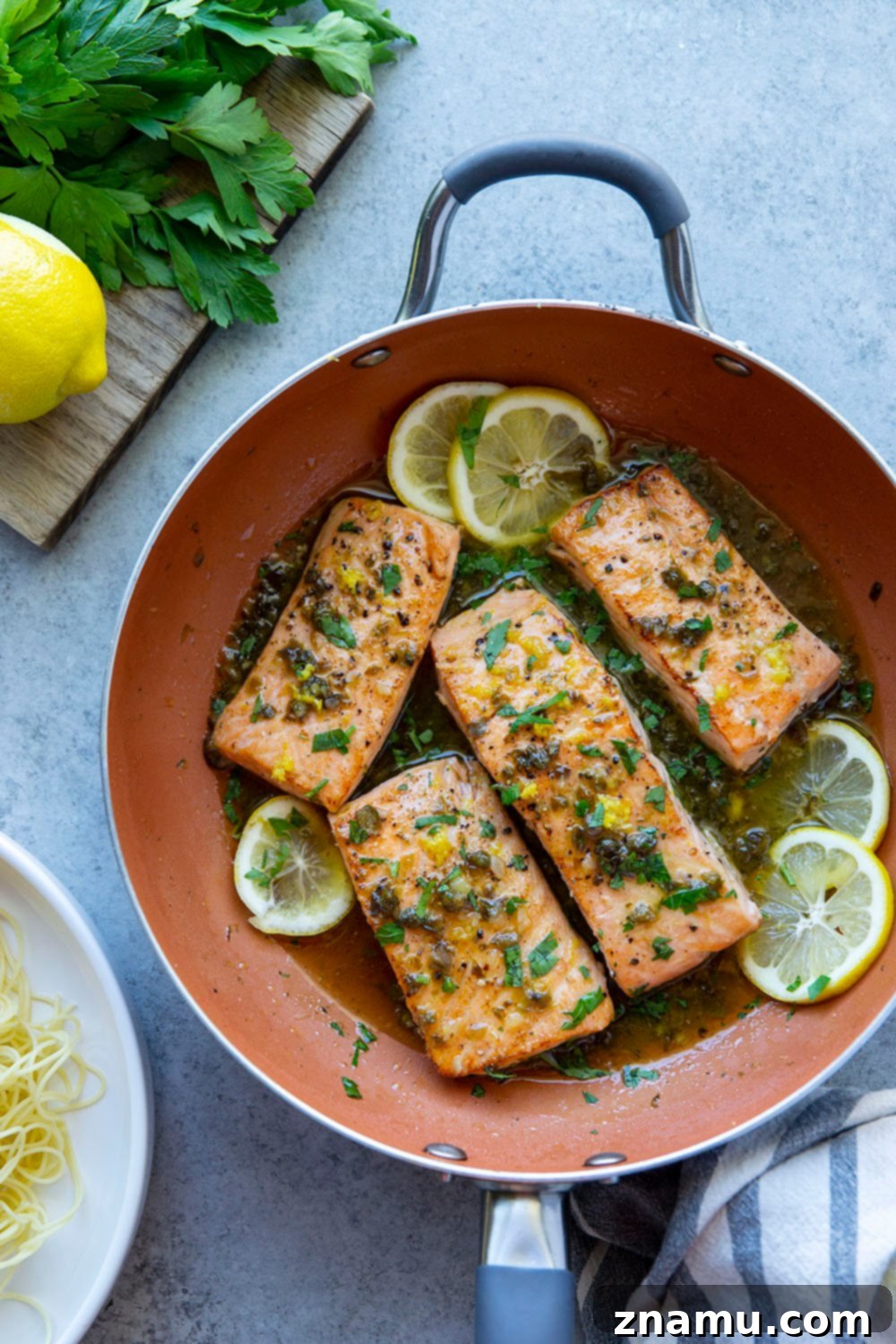 Weeknight Salmon Piccata Skillet 4 Ingredients for One Pan Salmon Piccata laid out on a table.
