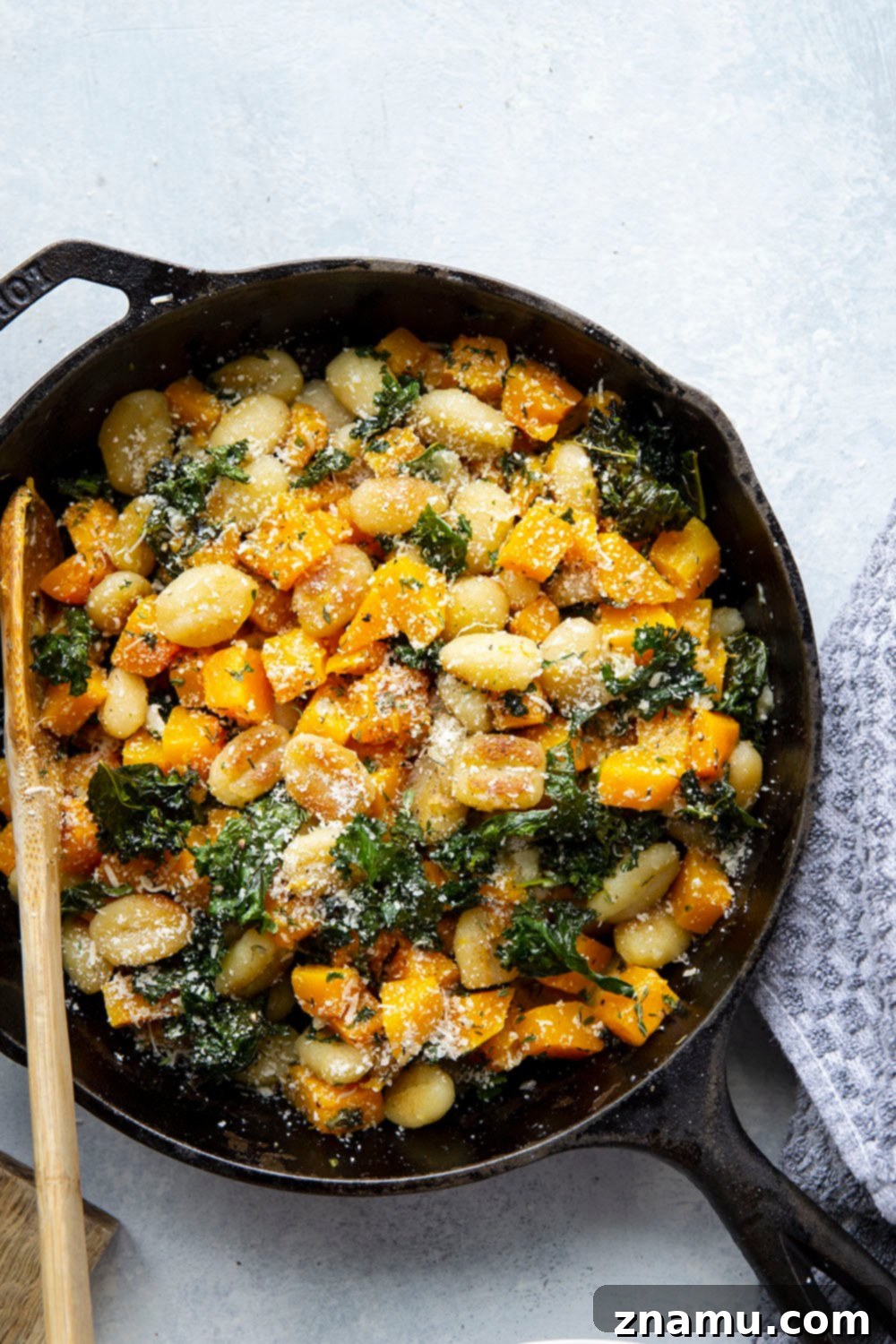 Roasted Butternut Garlic Gnocchi 2 Pan-fried gnocchi meets tender butternut squash and flavorful roasted garlic in this easy butternut squash and gnocchi skillet! A perfect fall dinner.