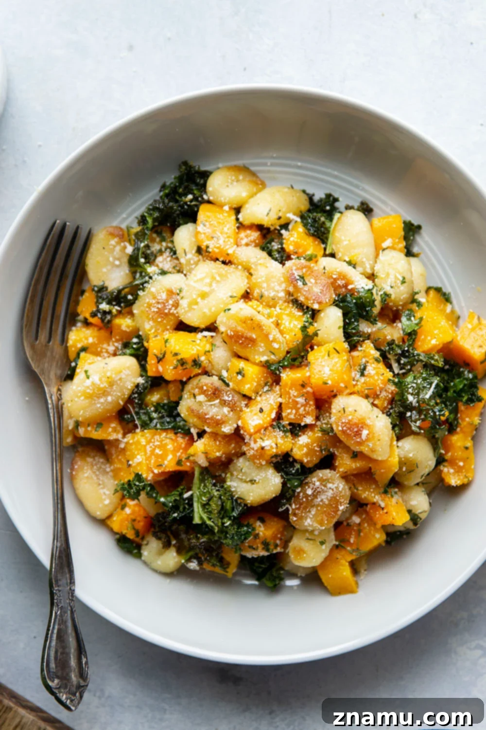 Roasted Butternut Garlic Gnocchi 4 Ingredients for butternut squash and gnocchi skillet: gnocchi, butternut squash, kale, garlic, olive oil, butter, Parmesan, thyme.
