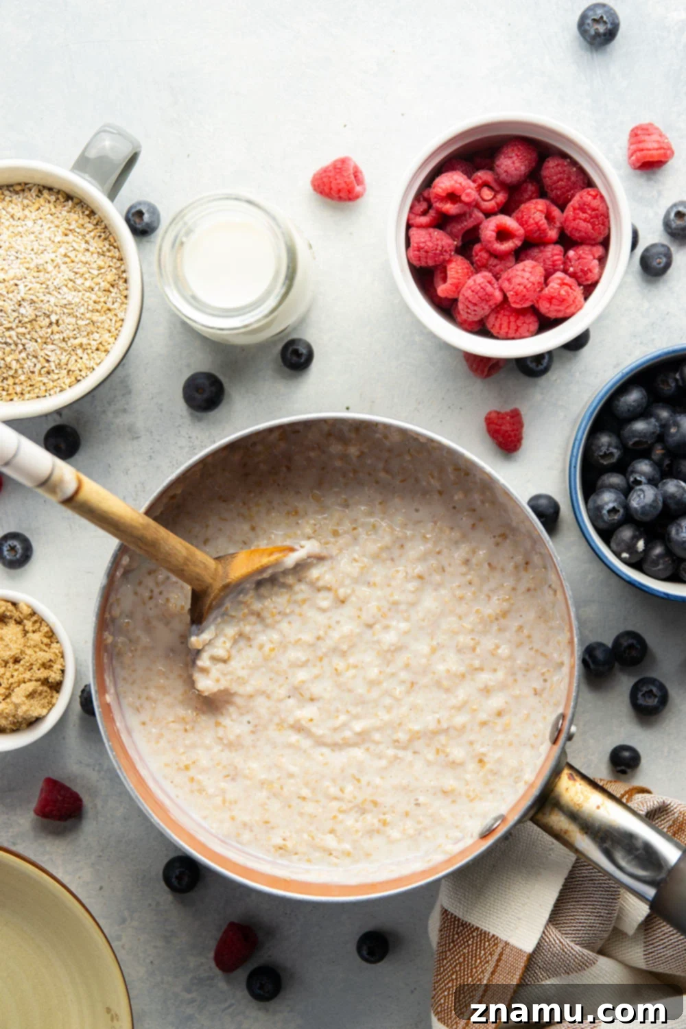 The Secret to Irresistible Steel-Cut Oats 3 Close-up shot of creamy steel cut oats in a bowl, ready for toppings.