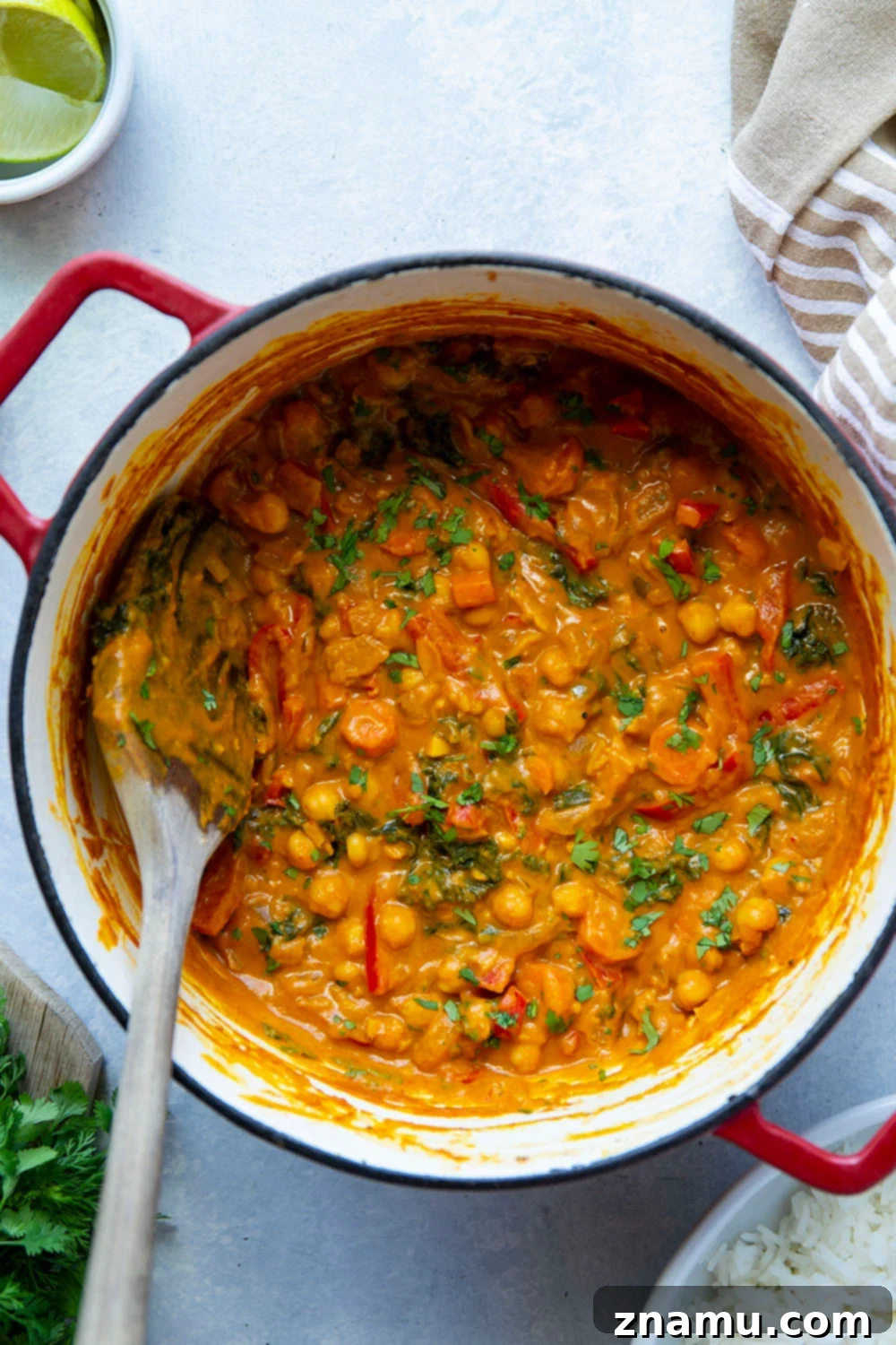 Golden Thai Pumpkin Curry 3 Close-up of a bowl of Thai pumpkin curry showcasing its rich, orange color and chunky vegetables. Perfect for fall meals.