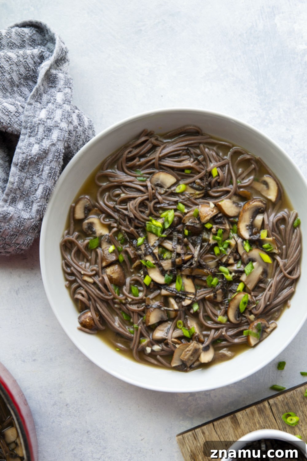 Soulful Miso Mushroom Noodles 3 Close-up shot of Miso Mushroom Noodle Soup, showcasing the deep broth and various mushroom textures.