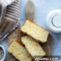 Everything Bagel Cheesy Loaf 8 Thumbnail image of Cheesy Everything Bagel Quick Bread, perfect for recipe cards.
