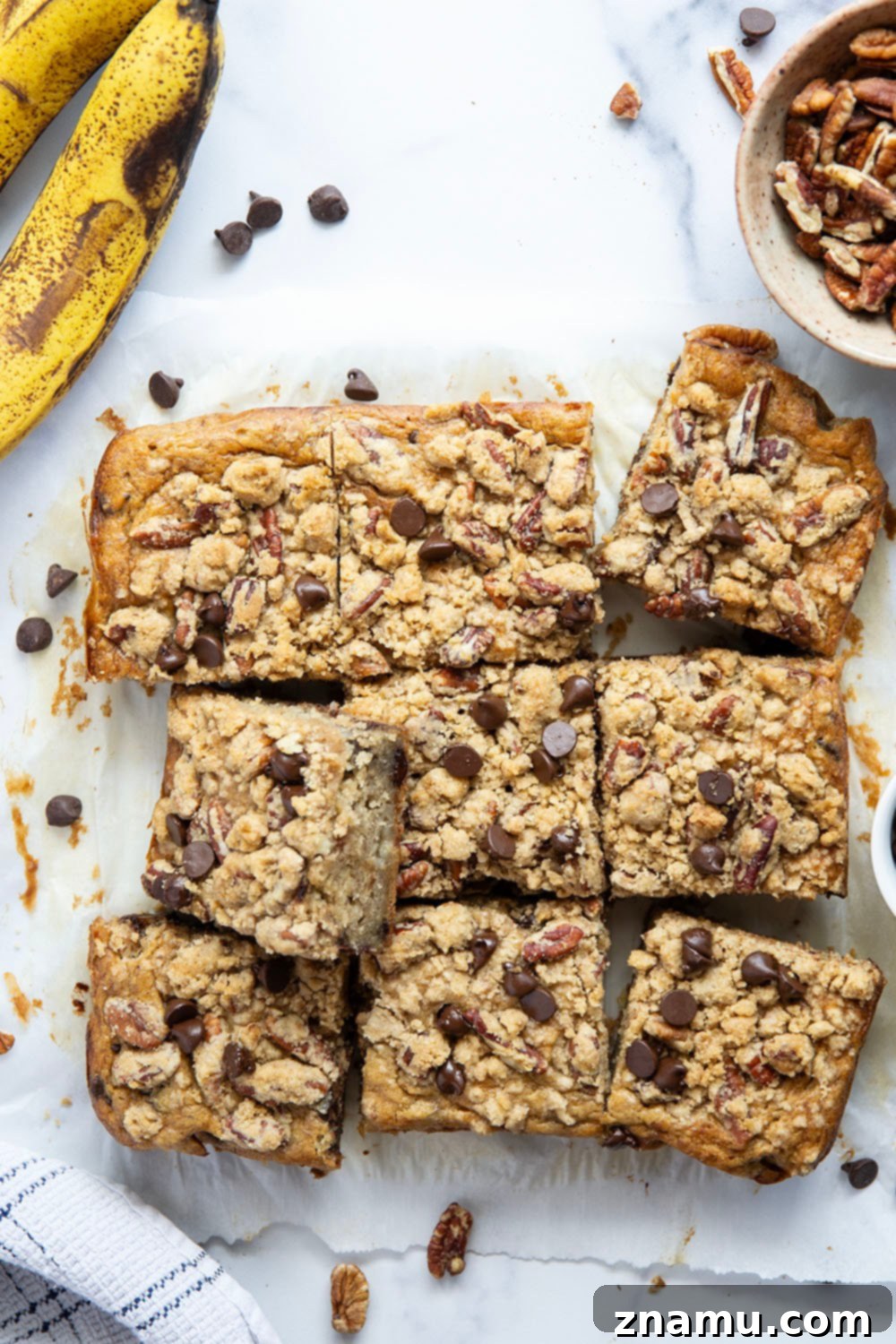 Banana & Chocolate Chip Coffee Cake 6 A top-down shot of the banana chocolate chip coffee cake, highlighting the golden streusel and moist texture.