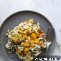 Tender butternut squash and flavorful wild rice are the perfect duo in this creamy, hearty wild rice casserole!