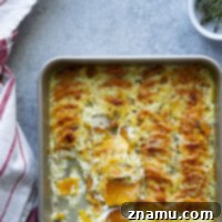 Golden Three-Cheese Sweet Potato Gratin 8 This sweet potato au gratin features tender sweet potatoes in a rich cream sauce with lots of gouda, gruyere, and Parmesan cheese baked on top.