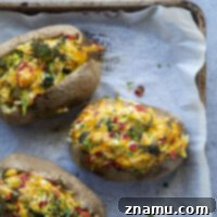 Loaded Broccoli Cheddar Potatoes 8 Filled with a rich broccoli cheddar topping and lots of fluffy potato, these broccoli cheddar baked potatoes are the easiest side dish that are a guaranteed hit alongside any meal!