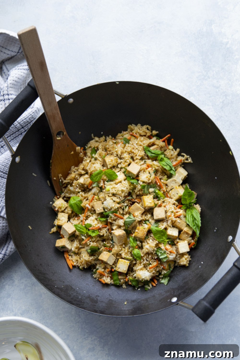 Crispy Sesame Tofu with Aromatic Thai Basil Fried Rice 5 This Thai basil fried rice features the most flavorful basil fried rice with lots of crispy sesame marinated tofu. - it's so easy to make in minutes using leftover cooked rice!