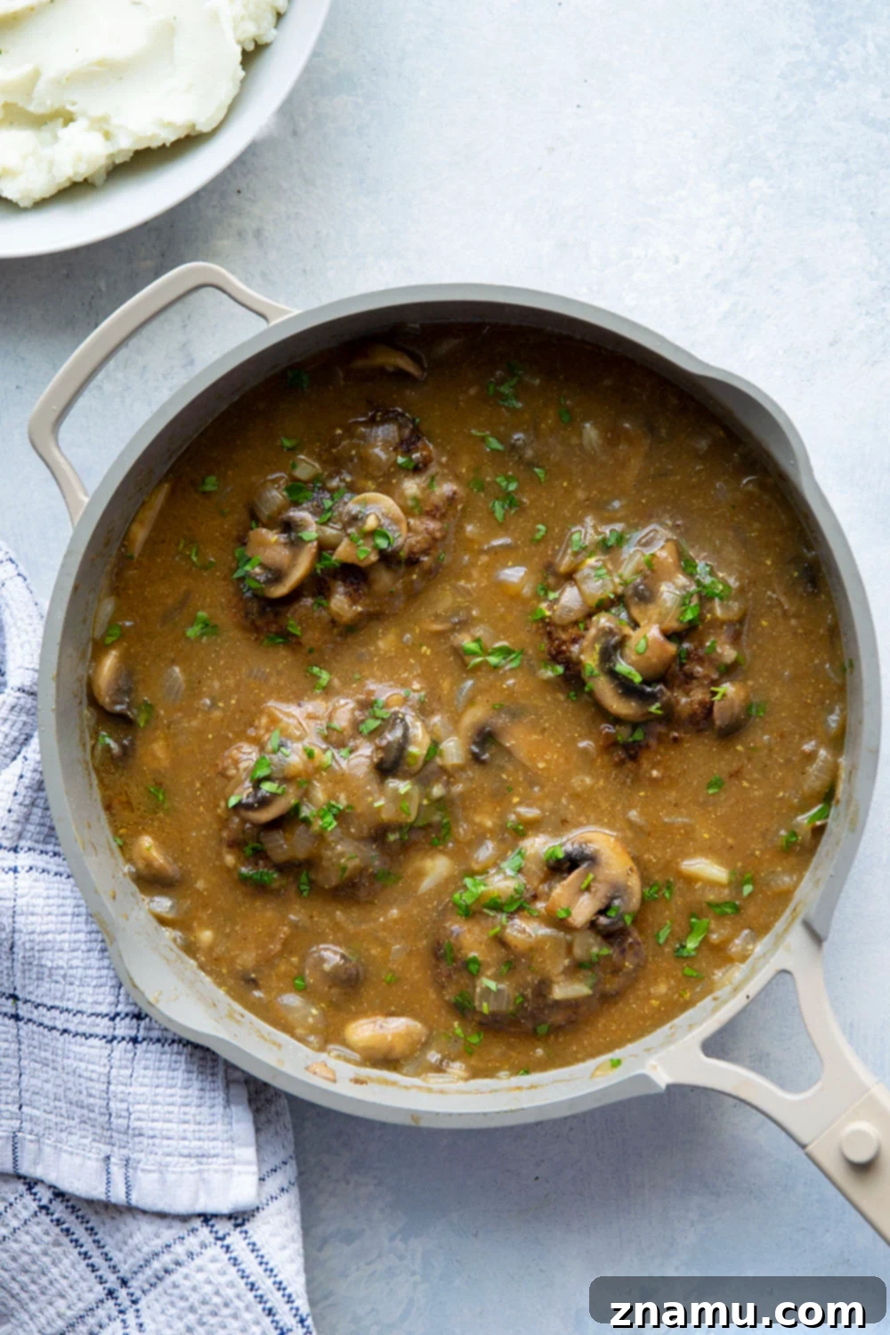Simple One Pan Salisbury Steak 2 This one pan Salisbury steak features the most tender steaks simmered in a rich mushroom gravy sauce. Absolutely to die for over a bowl of creamy mashed potatoes!