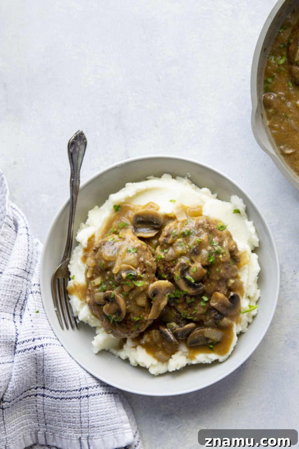 Simple One Pan Salisbury Steak 3 This one pan Salisbury steak features the most tender steaks simmered in a rich mushroom gravy sauce. Absolutely to die for over a bowl of creamy mashed potatoes!