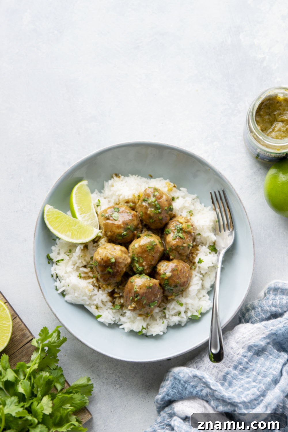 Ginger-Kissed Emerald Curry Chicken Meatballs 3 These green curry chicken meatballs feature tender chicken meatballs simmered in the most amazing gingery green curry sauce. Serve over a pile of hot rice with lots of fresh cilantro and lime!