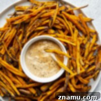 These air fryer sweet potato fries have the perfect crispy texture with a flavorful seasoning blend and are unbeatable dipped in a spicy chipotle aioli!