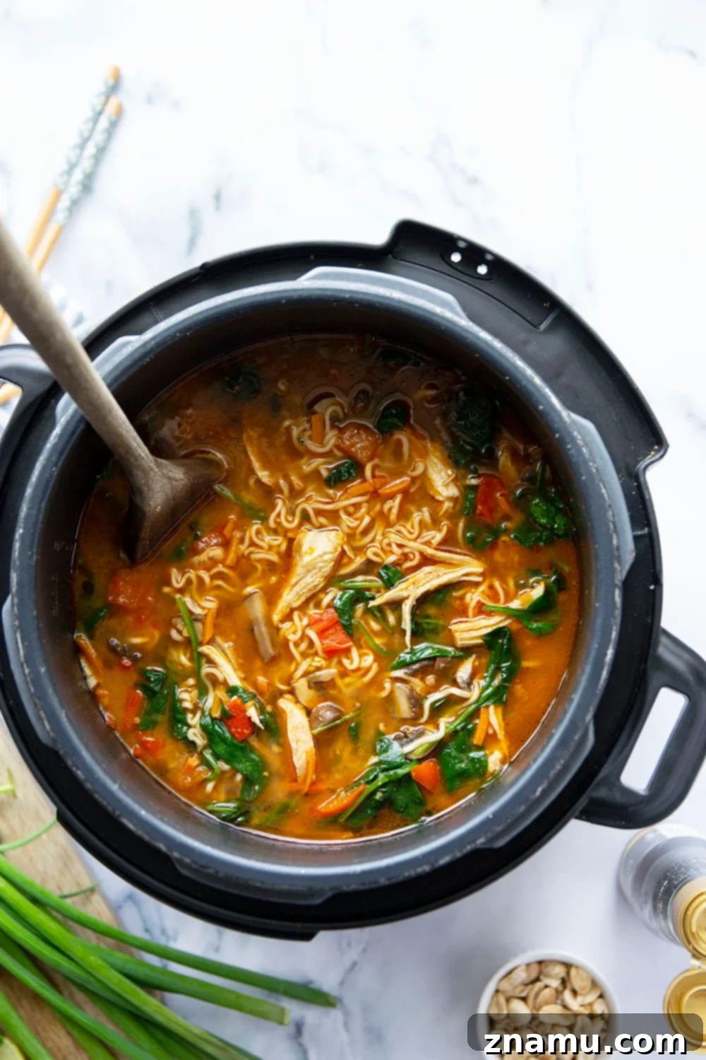 Ultimate Instant Pot Thai Peanut Chicken Ramen 3 This Thai peanut chicken ramen is made in under an hour entirely in the instant pot and is amazing loaded up with all your favorite ramen toppings!
