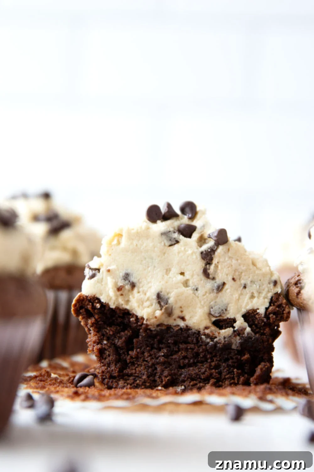 Ultimate Cookie Dough Brownie Cupcakes 2 Fudgy brownie cupcakes are frosted with a rich and creamy cookie dough frosting and combines the best of both dessert worlds in one cupcake!