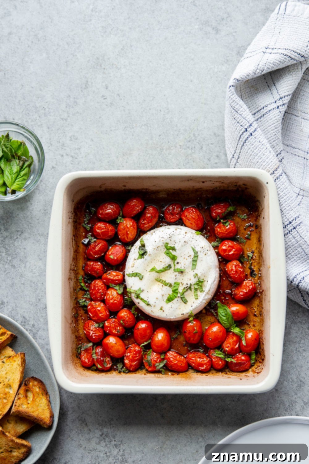 Baked Brie with Roasted Cherry Tomatoes and Fresh Herbs 3 Irresistible pan of melty baked brie cheese with roasted cherry tomatoes and fresh herbs.