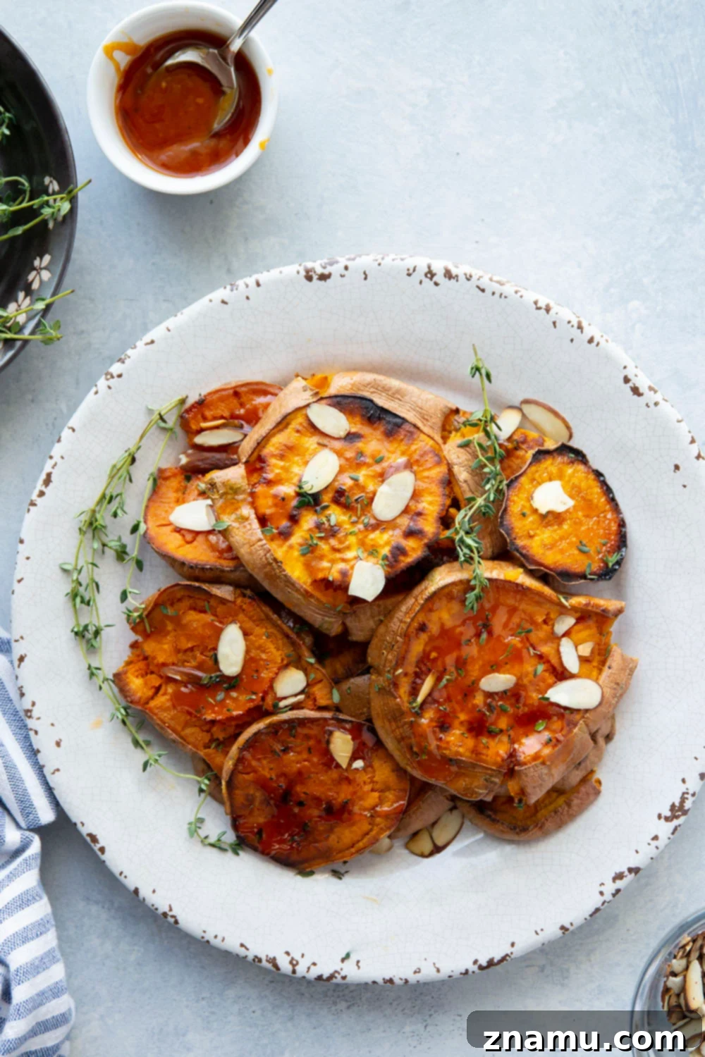 Crispy Smashed Sweet Potatoes with Hot Honey 3 Perfectly crispy smashed sweet potatoes are drizzled with a flavorful hot honey butter sauce and the easiest weeknight side dish that goes with anything!