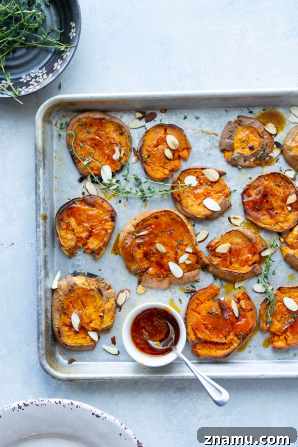 Crispy Smashed Sweet Potatoes with Hot Honey 4 Perfectly crispy smashed sweet potatoes are drizzled with a flavorful hot honey butter sauce and the easiest weeknight side dish that goes with anything!