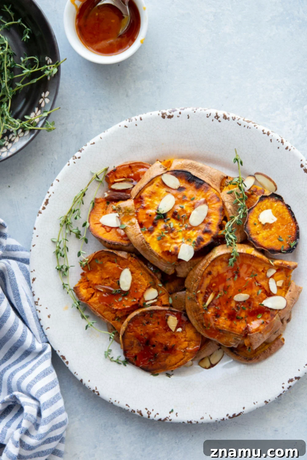 Crispy Smashed Sweet Potatoes with Hot Honey 5 Perfectly crispy smashed sweet potatoes are drizzled with a flavorful hot honey butter sauce and the easiest weeknight side dish that goes with anything!