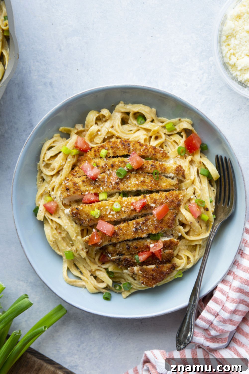 Golden Crispy Cajun Chicken Alfredo 3 Crispy cajun breaded chicken cutlets and creamy fettuccine alfredo are the perfect duo in this flavor-packed cajun chicken fettuccine alfredo that's sure to become a weeknight regular!