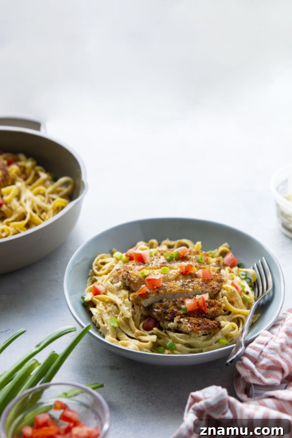 Golden Crispy Cajun Chicken Alfredo 6 Crispy cajun breaded chicken cutlets and creamy fettuccine alfredo are the perfect duo in this flavor-packed cajun chicken fettuccine alfredo that's sure to become a weeknight regular!